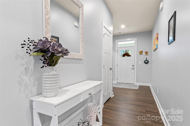 5079 Skyfest Dr, Charlotte, NC 28215 - hallway featuring recessed lighting, dark wood-type flooring, and baseboards