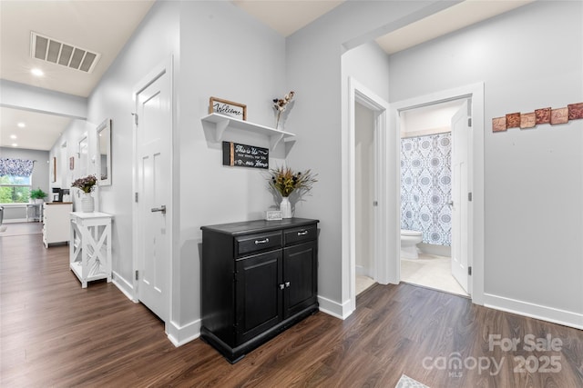 5079 Skyfest Dr, Charlotte, NC 28215 - corridor featuring dark wood-style floors, baseboards, and recessed lighting