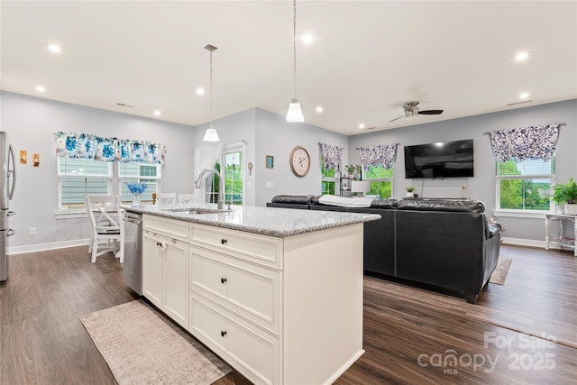 5079 Skyfest Dr, Charlotte, NC 28215 - kitchen featuring a sink, appliances with stainless steel finishes, a ceiling fan, white cabinetry, and dark wood-style flooring
