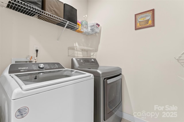 5079 Skyfest Dr, Charlotte, NC 28215 - washroom with washer and dryer