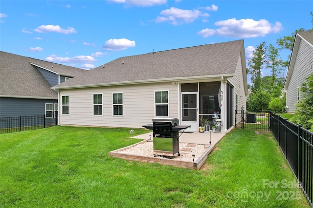 5079 Skyfest Dr, Charlotte, NC 28215 - back of house featuring a patio, a sunroom, and roof with shingles