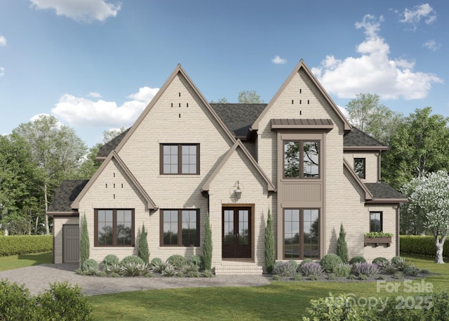 608 Deodar Cedar Dr Unit 69, Matthews, NC 28104 - view of front of home featuring french doors, a front lawn, and roof with shingles