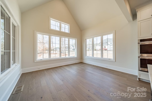 608 Deodar Cedar Dr Unit 69, Matthews, NC 28104 - unfurnished sunroom featuring lofted ceiling