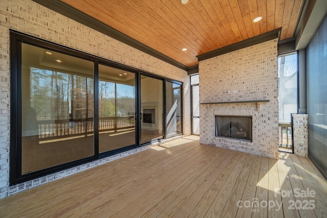 608 Deodar Cedar Dr Unit 69, Matthews, NC 28104 - wooden terrace featuring an outdoor brick fireplace