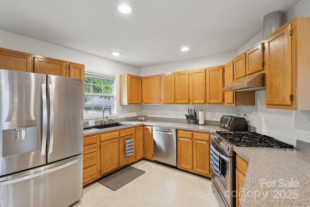 3721 Conway Ave, Charlotte, NC 28209 - kitchen with appliances with stainless steel finishes, a sink, under cabinet range hood, light countertops, and recessed lighting