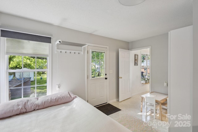 3721 Conway Ave, Charlotte, NC 28209 - bedroom with baseboards and a textured ceiling