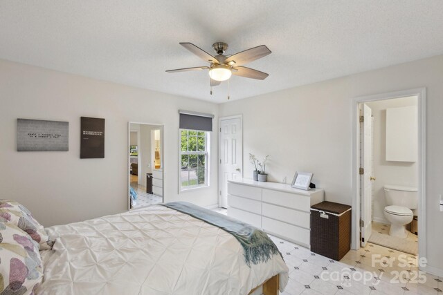 3721 Conway Ave, Charlotte, NC 28209 - bedroom featuring ensuite bathroom, ceiling fan, and baseboards
