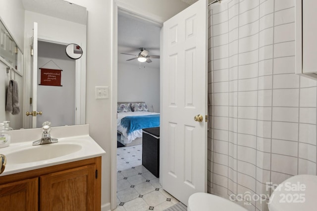 3721 Conway Ave, Charlotte, NC 28209 - bathroom with toilet, a ceiling fan, vanity, and ensuite bathroom