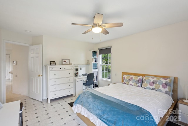 3721 Conway Ave, Charlotte, NC 28209 - bedroom with light flooring, a ceiling fan, and a desk