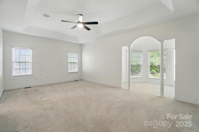 201 Limerick Dr, Matthews, NC 28104 - unfurnished room with a tray ceiling, ceiling fan, baseboards, and light colored carpet