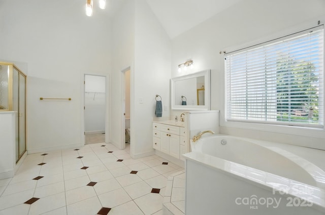 201 Limerick Dr, Matthews, NC 28104 - bathroom with a bath, vanity, a stall shower, toilet, and tile patterned floors