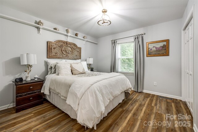 7712 Old Waxhaw Monroe Rd, Waxhaw, NC 28173 - bedroom with wood finished floors and baseboards