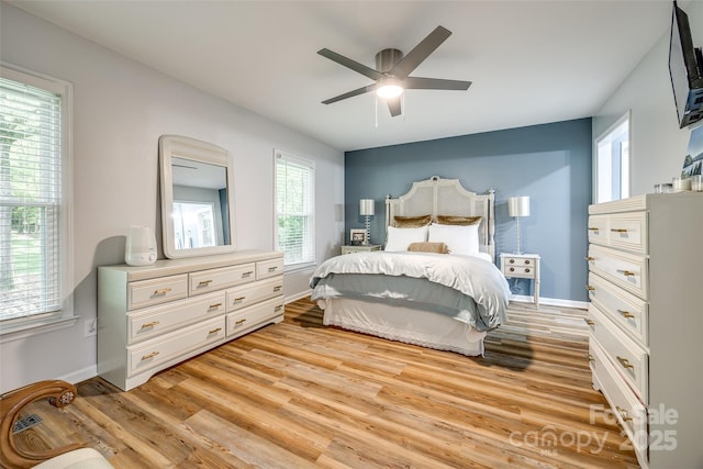 7712 Old Waxhaw Monroe Rd, Waxhaw, NC 28173 - bedroom featuring light wood-type flooring, baseboards, and ceiling fan