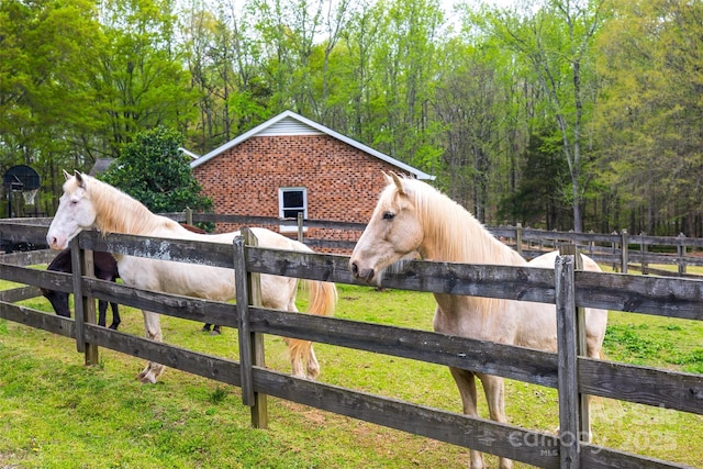 7712 Old Waxhaw Monroe Rd, Waxhaw, NC 28173 - horse barn featuring a view of trees