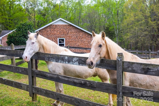 7712 Old Waxhaw Monroe Rd, Waxhaw, NC 28173 - horse barn featuring a forest view