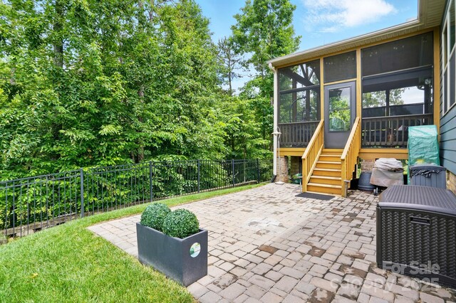 10903 Skymont Dr, Huntersville, NC 28078 - fenced backyard with a sunroom, a patio, and stairway