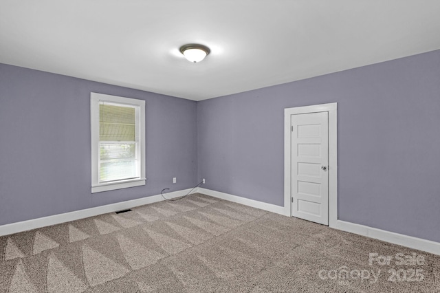 222 W Mccubbins St, Salisbury, NC 28144 - empty room featuring carpet floors and baseboards