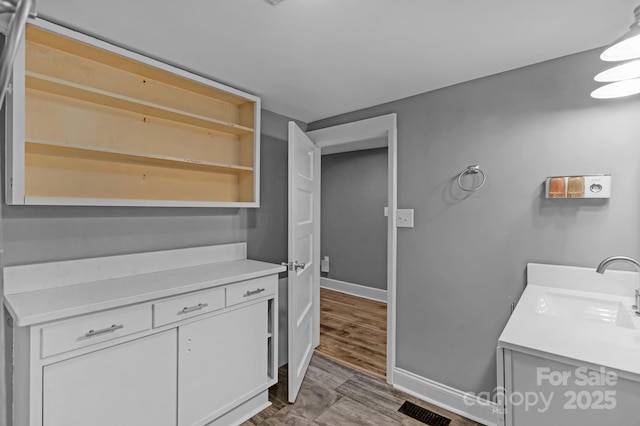 222 W Mccubbins St, Salisbury, NC 28144 - bathroom featuring vanity and baseboards