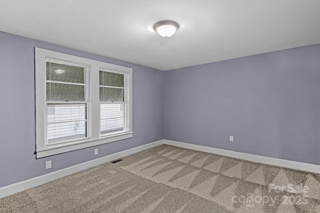 222 W Mccubbins St, Salisbury, NC 28144 - empty room with baseboards and light colored carpet