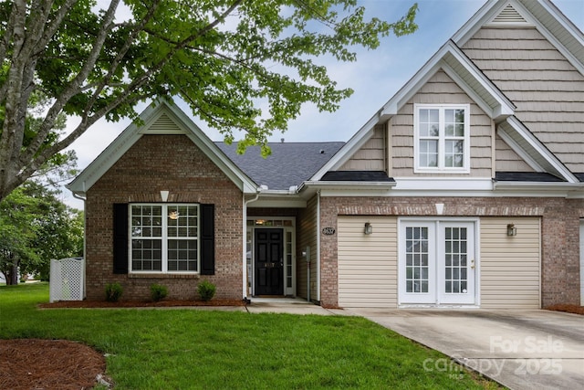 4637 Willow Glen Rd, Harrisburg, NC 28075 - view of front of house with brick siding and a front yard
