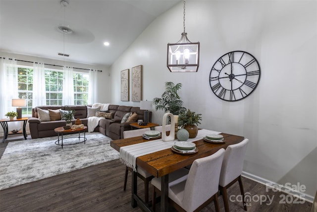 4637 Willow Glen Rd, Harrisburg, NC 28075 - dining space with lofted ceiling, dark wood-type flooring, a chandelier, and recessed lighting