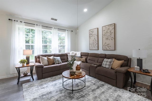 4637 Willow Glen Rd, Harrisburg, NC 28075 - living room featuring wood finished floors, vaulted ceiling, recessed lighting, and baseboards