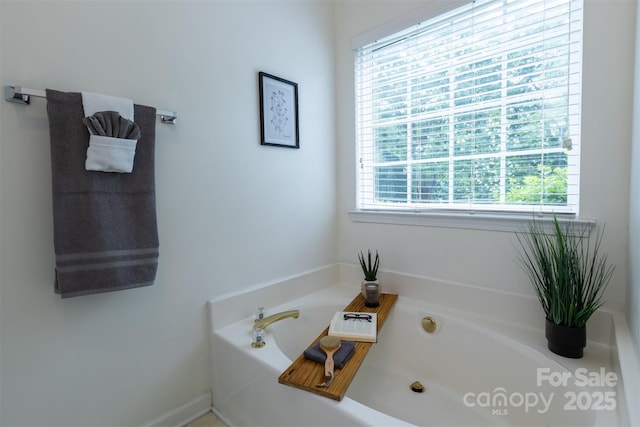 4637 Willow Glen Rd, Harrisburg, NC 28075 - bathroom with a bath