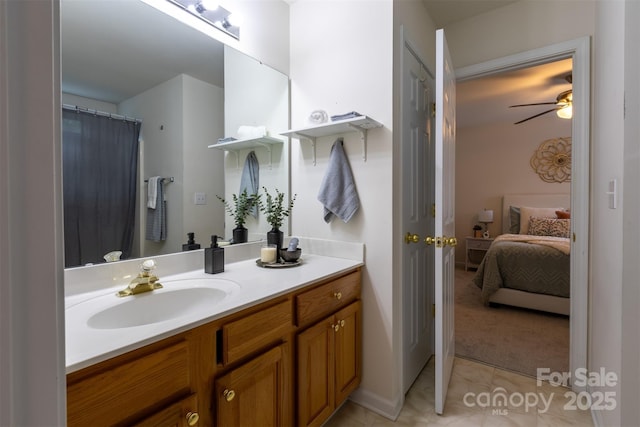 4637 Willow Glen Rd, Harrisburg, NC 28075 - ensuite bathroom featuring vanity, a ceiling fan, and tile patterned floors
