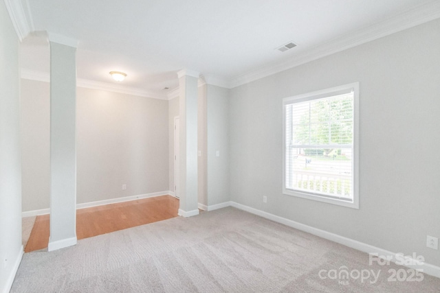 9641 Bellamy Pl NW, Concord, NC 28027 - carpeted spare room featuring crown molding and baseboards