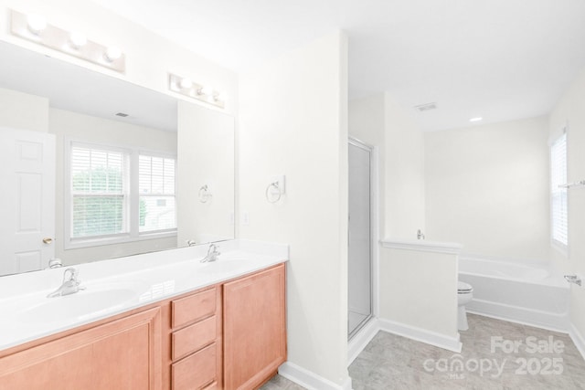9641 Bellamy Pl NW, Concord, NC 28027 - full bath with toilet, double vanity, a bath, a shower stall, and tile patterned flooring