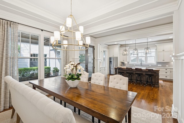 2221 Kenmore Ave, Charlotte, NC 28204 - dining area with a chandelier, crown molding, and wood finished floors