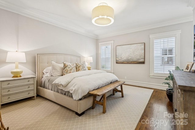2221 Kenmore Ave, Charlotte, NC 28204 - bedroom featuring ornamental molding, wood finished floors, and baseboards