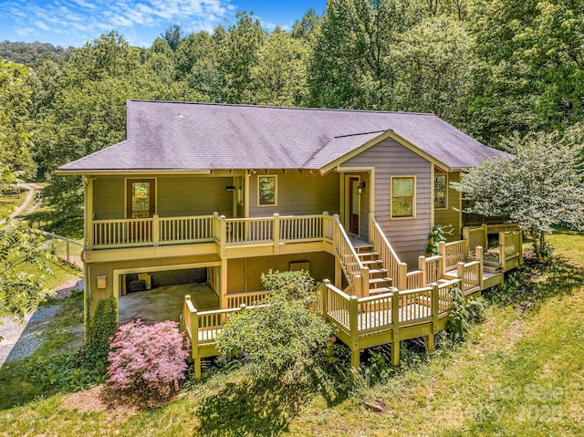 276 Morgan Branch Rd, Marshall, NC 28753 - chalet / cabin featuring stairs, roof with shingles, a forest view, and a deck