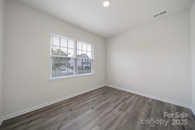 300 Kennerly Center Dr, Mooresville, NC 28115 - empty room with wood finished floors, baseboards, and recessed lighting