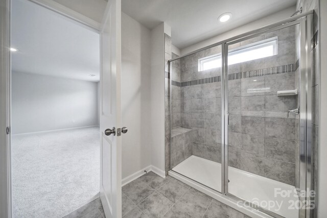 300 Kennerly Center Dr, Mooresville, NC 28115 - full bath with a shower stall, baseboards, and tile patterned flooring