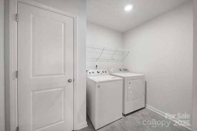 300 Kennerly Center Dr, Mooresville, NC 28115 - laundry area featuring separate washer and dryer and baseboards