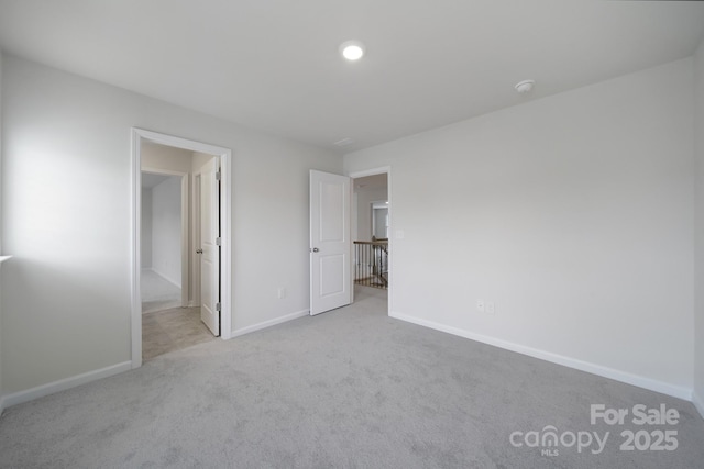 300 Kennerly Center Dr, Mooresville, NC 28115 - unfurnished bedroom with carpet flooring and baseboards