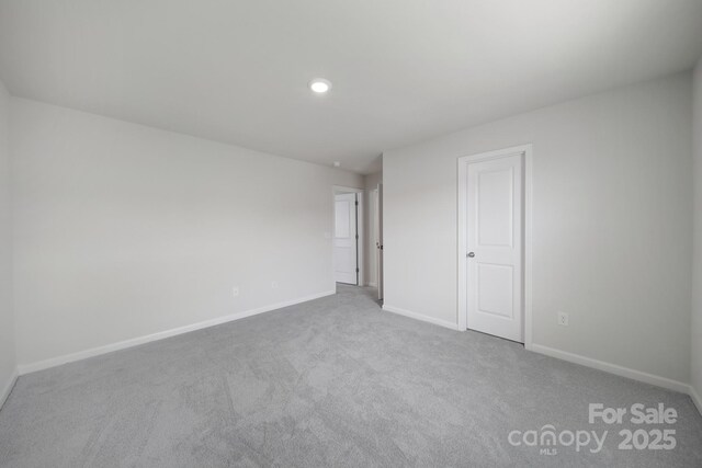 300 Kennerly Center Dr, Mooresville, NC 28115 - carpeted empty room with baseboards and recessed lighting