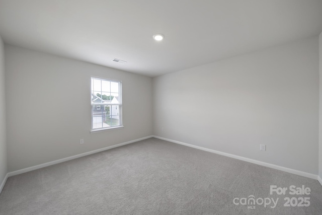 300 Kennerly Center Dr, Mooresville, NC 28115 - unfurnished room featuring baseboards, carpet floors, and recessed lighting