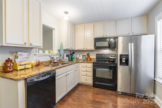1804 Fairlawn Ct, Rock Hill, SC 29732 - kitchen featuring black appliances, a sink, dark wood finished floors, and light stone counters