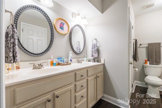 1804 Fairlawn Ct, Rock Hill, SC 29732 - bathroom with toilet, double vanity, and baseboards