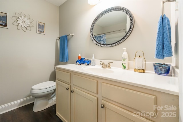 1804 Fairlawn Ct, Rock Hill, SC 29732 - bathroom featuring toilet, vanity, wood finished floors, baseboards, and a shower with curtain