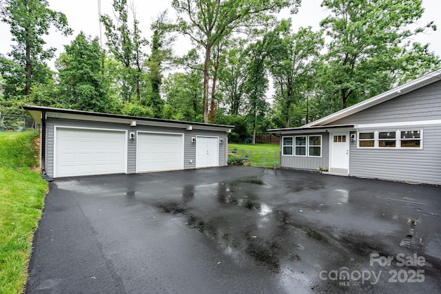 1035 15th Ave NW, Hickory, NC 28601 - detached garage with view of wooded area