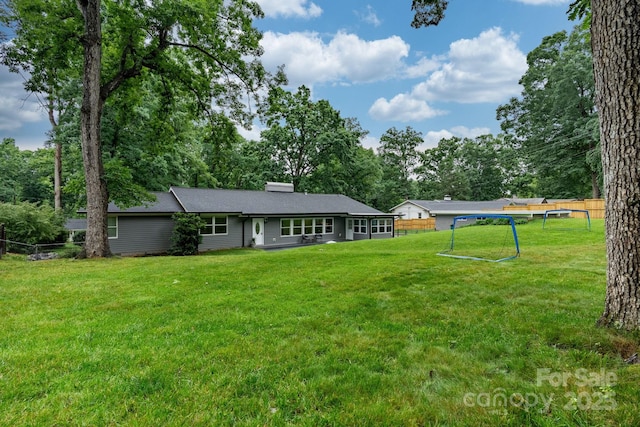 1035 15th Ave NW, Hickory, NC 28601 - back of property with view of scattered trees and a chimney