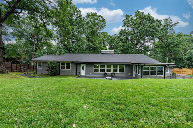 1035 15th Ave NW, Hickory, NC 28601 - rear view of property with a patio and a chimney