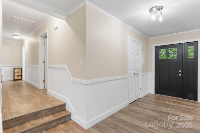 1035 15th Ave NW, Hickory, NC 28601 - entrance foyer featuring wood finished floors and ornamental molding