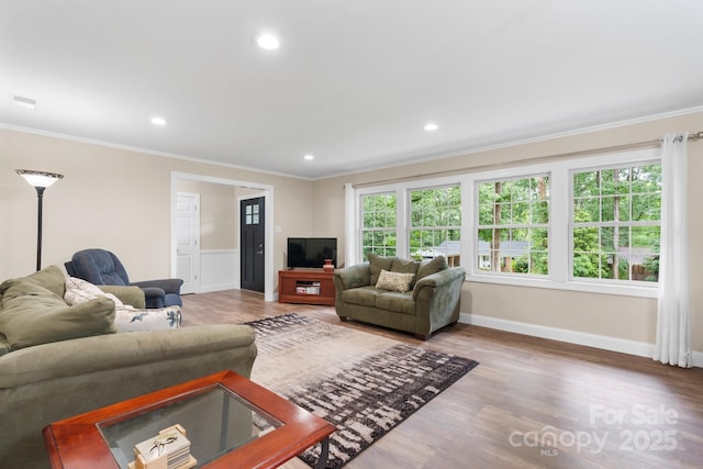 1035 15th Ave NW, Hickory, NC 28601 - living area featuring ornamental molding, wood finished floors, baseboards, and recessed lighting