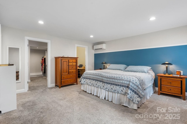 1035 15th Ave NW, Hickory, NC 28601 - bedroom featuring an AC wall unit, a spacious closet, carpet, recessed lighting, and a closet