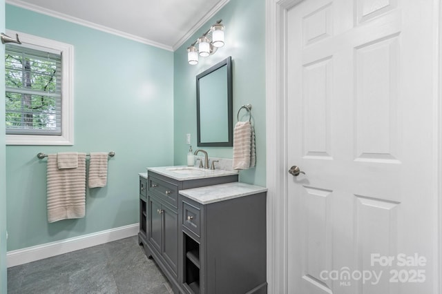 1035 15th Ave NW, Hickory, NC 28601 - bathroom with baseboards, vanity, and ornamental molding