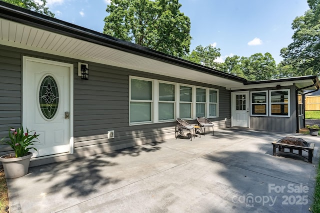 1035 15th Ave NW, Hickory, NC 28601 - view of patio featuring a fire pit